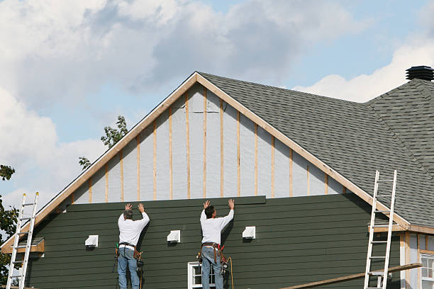 Professional Storm Damage Siding Repair technician working in Hays, NC